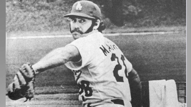 Dr. Mike Marshall pitching, biomechanics pioneer and first Major League Baseball pitcher to formally study kinesiology and apply it to the mechanics of throwing; shown mid-throw.